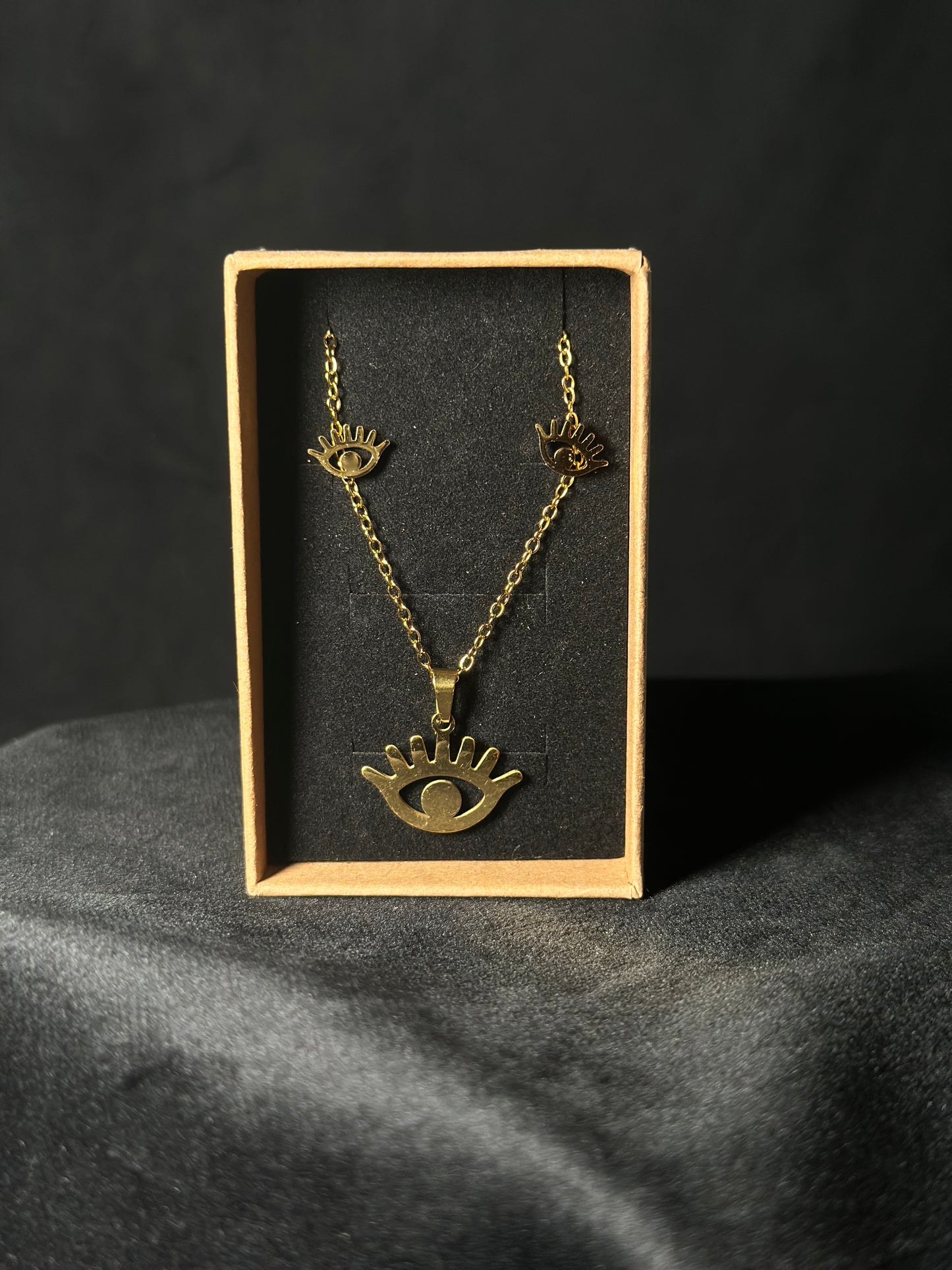 Set collana e orecchini in acciaio dorato – Occhio Portafortuna